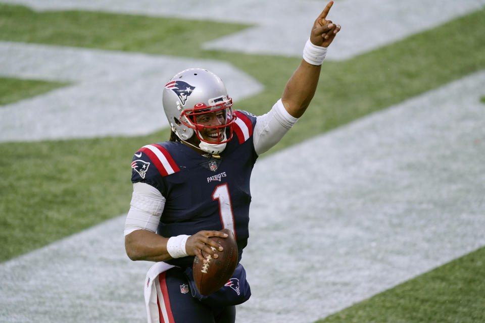 New England Patriots quarterback Cam Newton celebrates his touchdown catch of a pass thrown by wide receiver Jakobi Meyers during the second half of an NFL football game against the New York Jets, Sunday, Jan. 3, 2021, in Foxborough, Mass. (AP Photo/Elise Amendola)