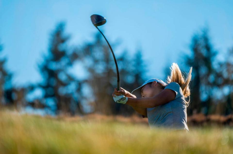 Jennifer Gu from Canada tees the ball while competing in the 122nd U.S. Women’s Amateur Championship at Chambers Bay Golf Course in University Place on Aug. 8, 2022.