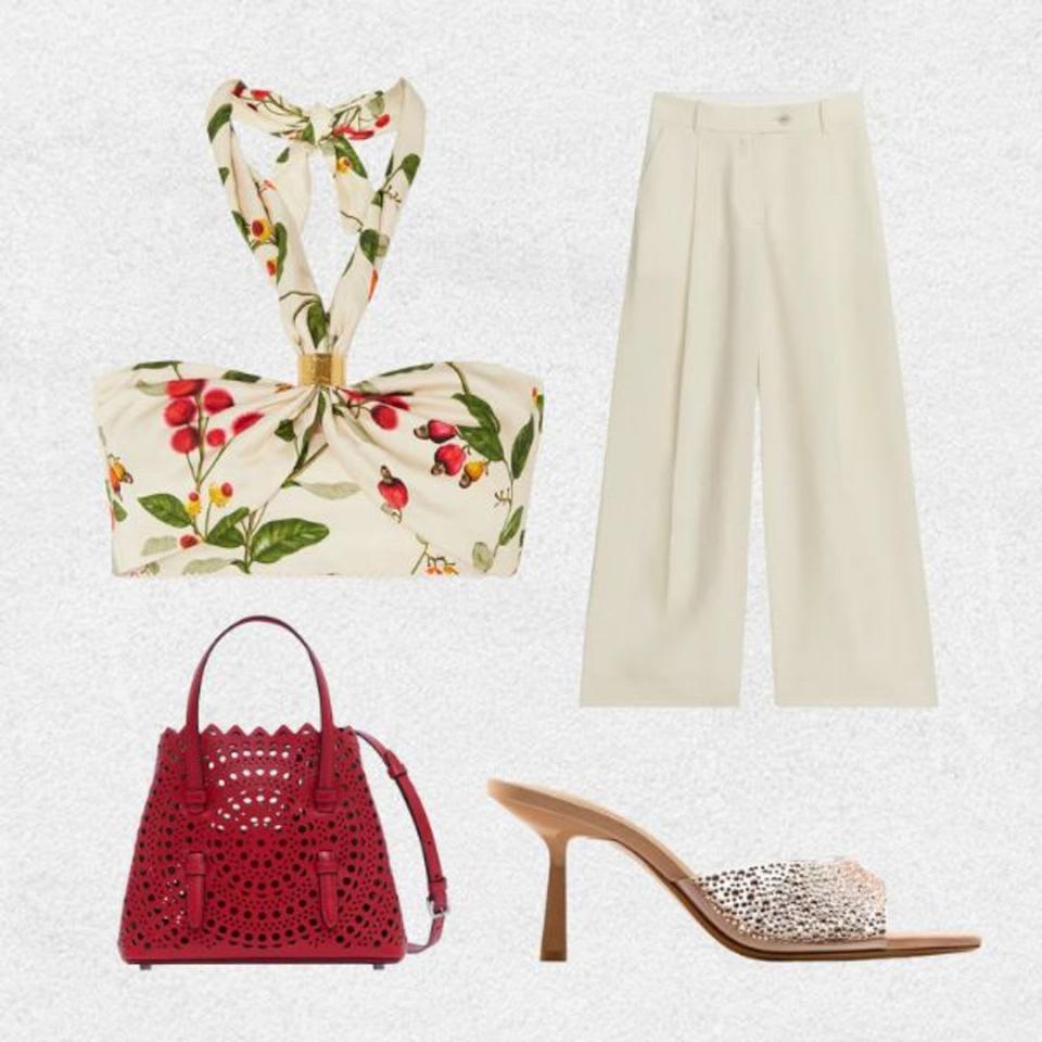 Rhinestone sandals styled with printed crop top, wide-leg trousers, and red perforated leather bag 