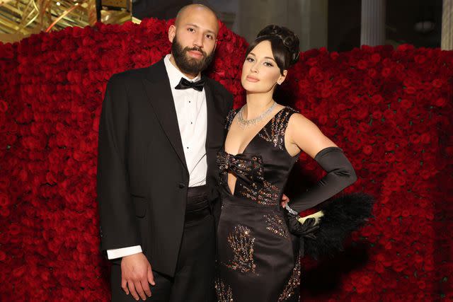 <p>Cindy Ord/MG22/Getty </p> Cole Schafer and Kacey Musgraves at the Met Gala in 2022