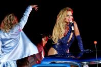 <p>Rita Ora puts on a dazzling performance during the 43rd Sydney Gay and Lesbian Mardi Gras Parade at the SCG on Saturday in Sydney, Australia. </p>