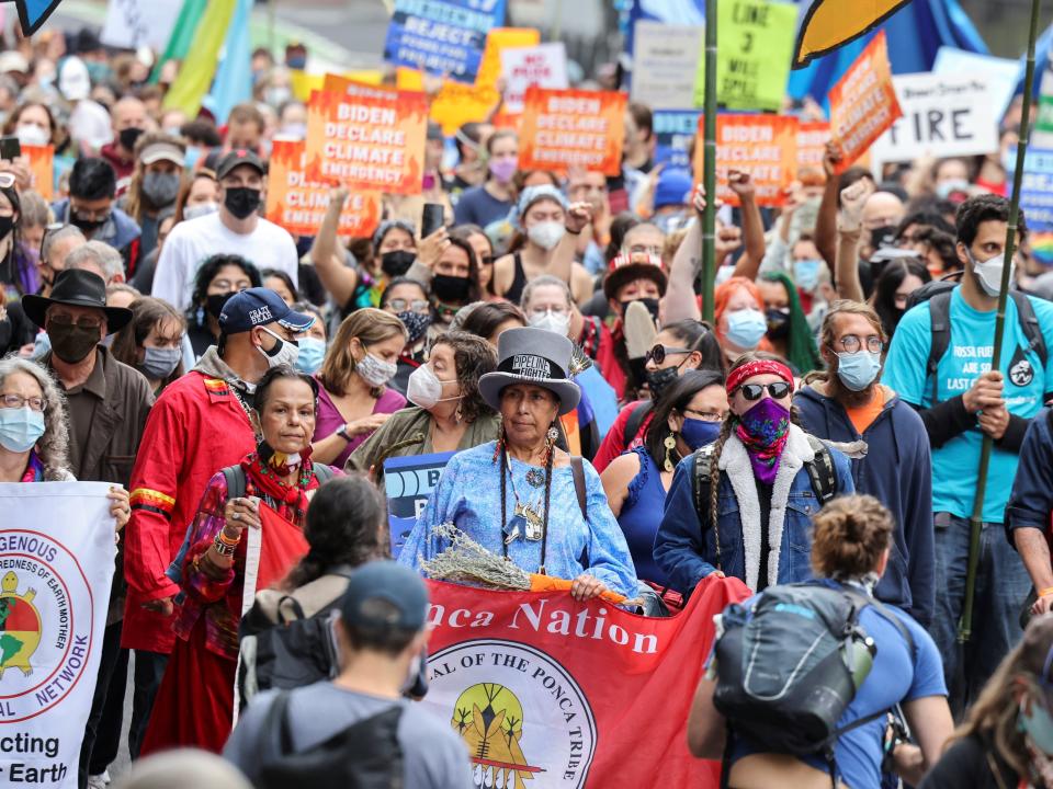 Indigenous activist hold protest in front of the White House demanding climate action