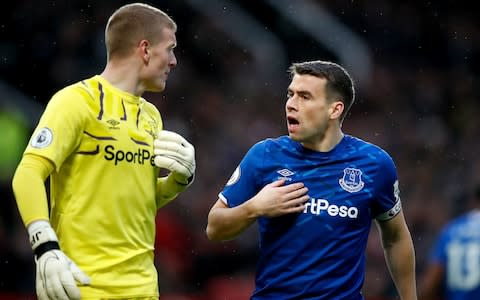 verton captain Seamus Coleman (right) has words with goalkeeper Jordan Pickford  - Credit: PA