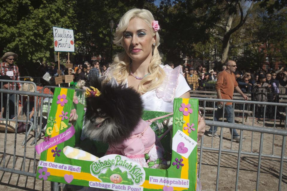 Victoria Viscardi arrives with her dog Gia during the 24th Annual Tompkins Square Halloween Dog Parade in New York