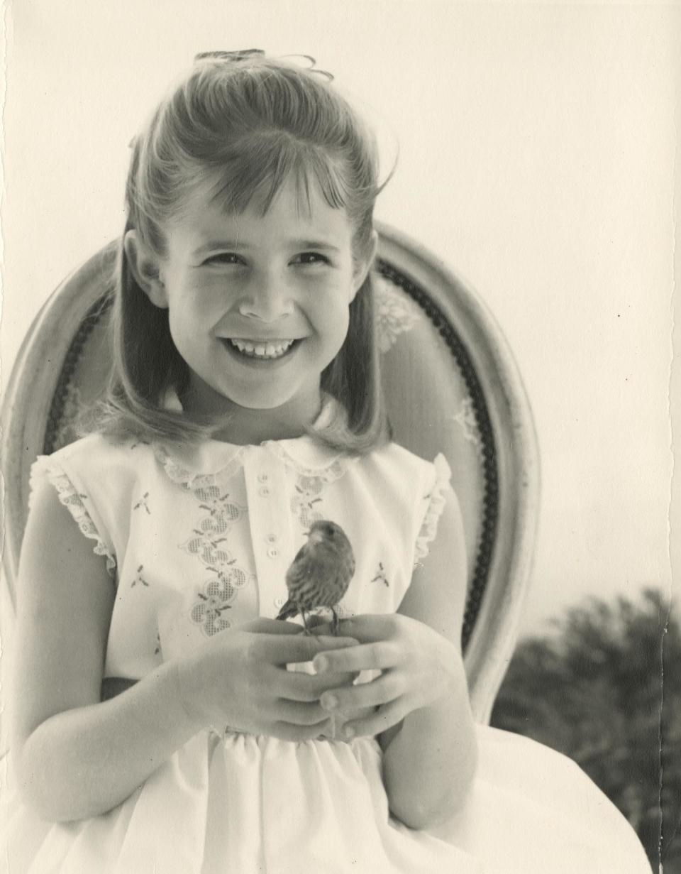 <p>"We have changed the auction three times now," explains Maddalena. "We keep finding stuff." One of the items up for sale is Reynolds' personal shot of a young Fisher with her pet bird Benny Karl, circa 1964. It's estimated to fetch somewhere between $100 and $200.</p>