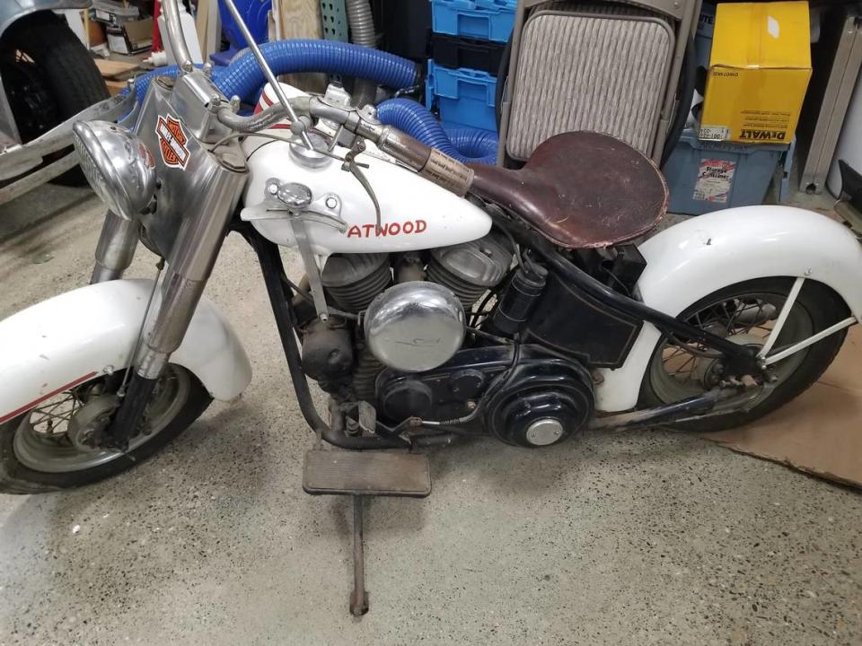 Left-side view of an antique motorcycle built in Modesto by Fred C. Atwood in 1951, before it was cleaned and mounted on a ledge 9 feet off the floor inside an Airbnb rental in Shingle Springs, Calif. in 2019.