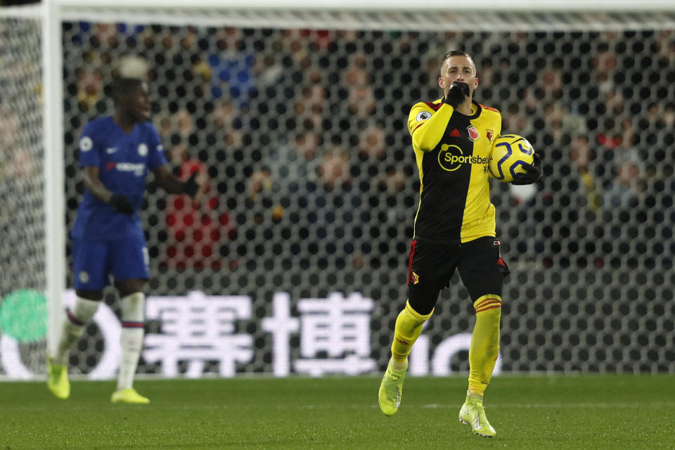 Watford's Spanish midfielder Gerard Deulofeu jogs after kicking a penalty and scoring his team's first goal during the English Premier League football match between Watford and Chelsea at Vicarage Road Stadium in Watford, north of London on November 2, 2019. (Photo by Adrian DENNIS / AFP) / RESTRICTED TO EDITORIAL USE. No use with unauthorized audio, video, data, fixture lists, club/league logos or 'live' services. Online in-match use limited to 120 images. An additional 40 images may be used in extra time. No video emulation. Social media in-match use limited to 120 images. An additional 40 images may be used in extra time. No use in betting publications, games or single club/league/player publications. /  (Photo by ADRIAN DENNIS/AFP via Getty Images)