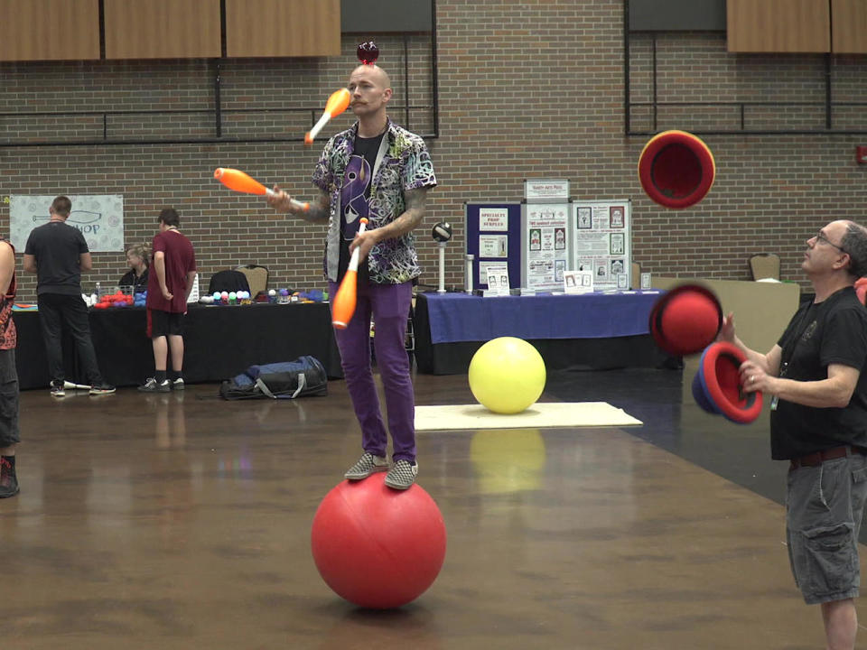 That's using your head: Scene at the International Jugglers' Association's annual festival of the juggling arts.  / Credit: CBS News