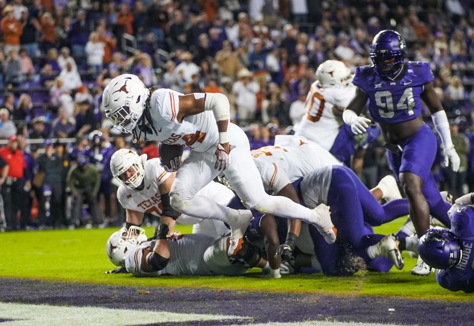 Texas running back Jonathon Brooks rushes in for a touchdown in the first quarter of Saturday's 29-26 win over TCU. The Longhorns' star tailback left the game in the fourth quarter with a torn knee ligament.