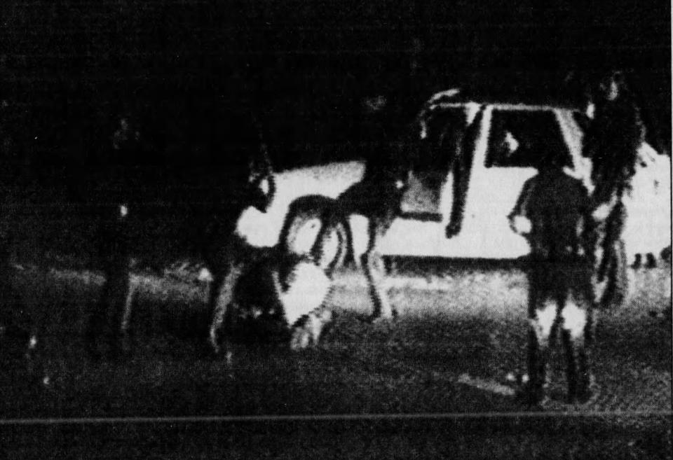 A videotape showed Los Angeles police officers beating Rodney King with nightsticks and kicking him as other officers watched on Sunday, March 3, 1991.