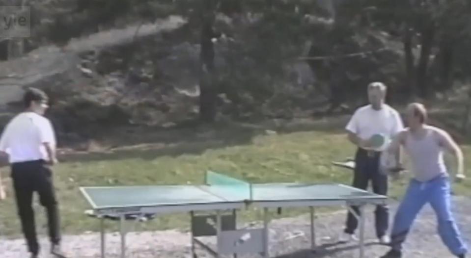 Putin (right) plays ping pong with other guests (Yle)