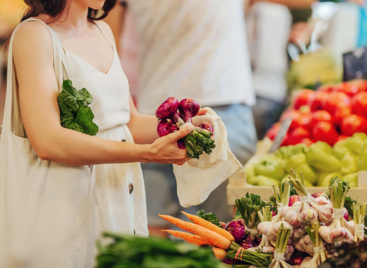 woman grocery shopping at a market