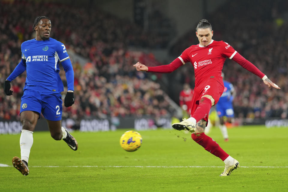 Liverpool's Darwin Nunez makes an attempt to score during the English Premier League soccer match between Liverpool and Chelsea, at Anfield Stadium, Liverpool, England, Wednesday, Jan.31, 2024. (AP Photo/Jon Super)