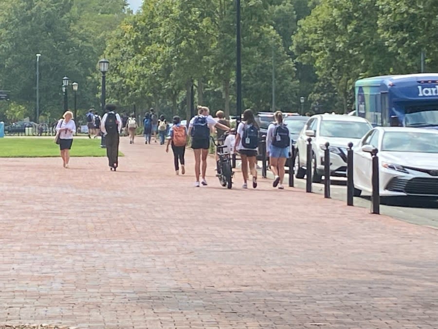 Students return to their dorms and vehicles after an all-clear is given on UNC-Chapel Hill’s campus. (Terrence Evans/CBS17)