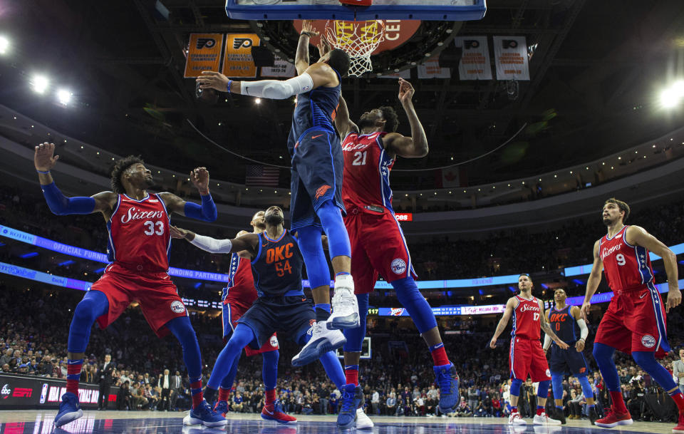 Andre Roberson over Joel Embiid for the win sounds like a Thunder fan fever dream, but it became reality on Friday night. (AP Photo/Chris Szagola)