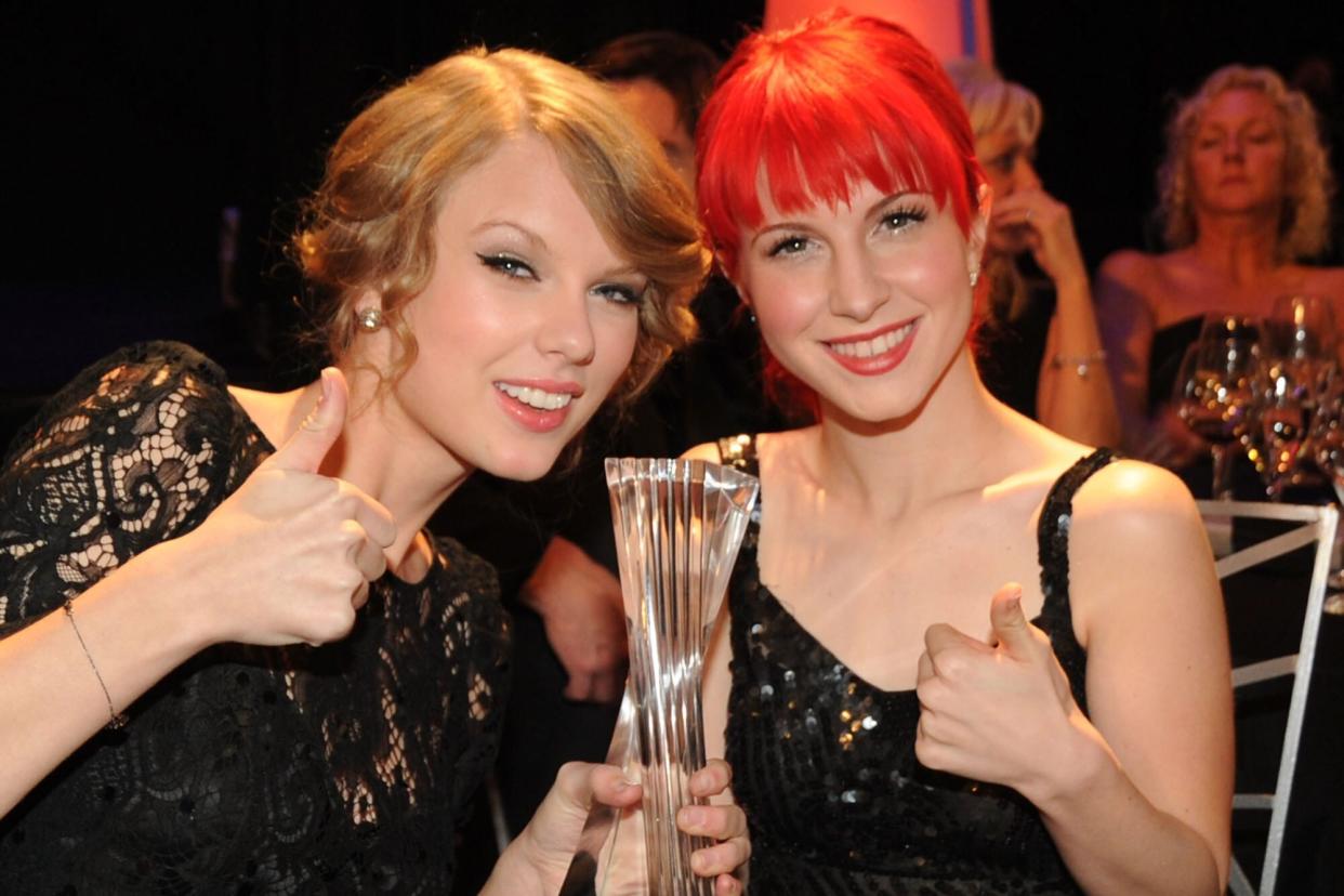 FRANKLIN, TN - NOVEMBER 30: ***EXCLUSIVE COVERAGE*** Honoree Taylor Swift and Recording Artists Hayley Williams of the group Paramore and Kid Rock at the CMT Artists of the Year at The Factory on November 30, 2010 in Franklin, Tennessee. (Photo by Rick Diamond/Getty Images for CMT)