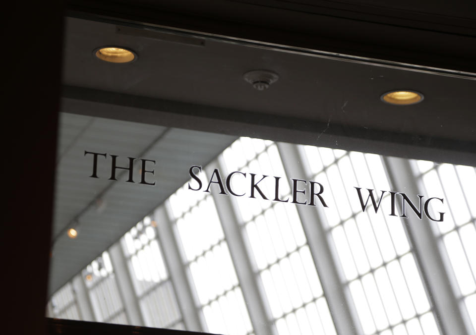 A sign with the Sackler name is displayed at the Metropolitan Museum of Art in New York, Thursday, Jan. 17, 2019. The Sackler name adorns walls at some of the world's top museums and universities, including the Met, the Guggenheim and Harvard. But the family's ties to the powerful painkiller OxyContin and the drug's role in the nation's deadly opioid crisis are bringing a new kind of attention to the Sacklers and their philanthropic legacy. (AP Photo/Seth Wenig)