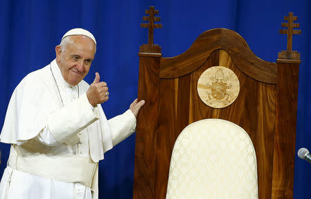 Pope Francis gestures to inmates as he meets with them at Curran-Fromhold Correctional Facility in Philadelphia, September 27, 2015. REUTERS/Tony Gentile/File Photo