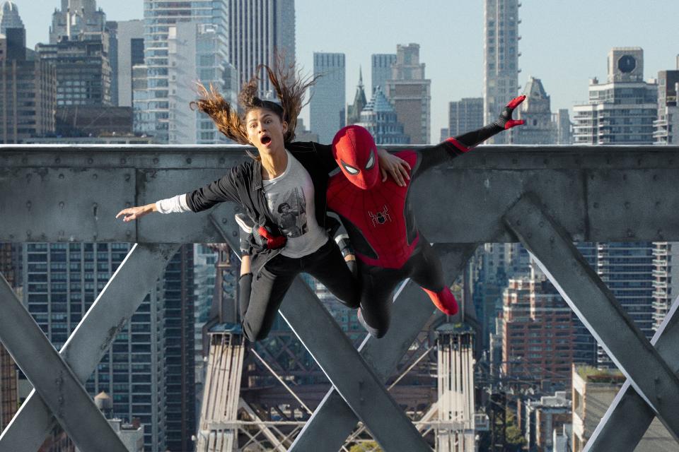 MJ and Spider-Man jumping off a platform in "Spider-Man: No Way Home."