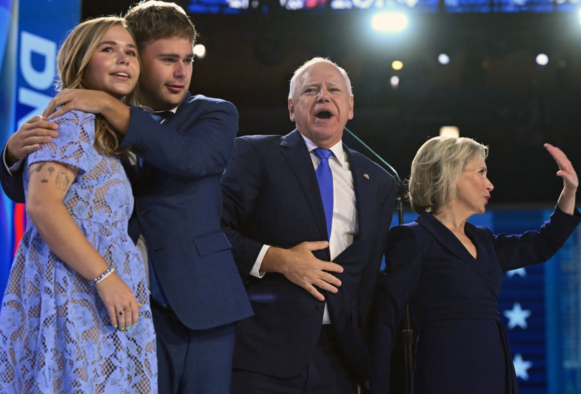 Minnesota Governor and 2024 Democratic vice presidential candidate Tim Walz stands with his wife Gwen Walz and children Gus Walz and Hope Walz<p>SAUL LOEB/AFP via Getty Images</p>