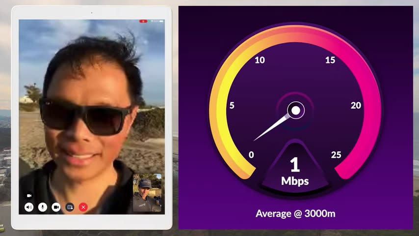  A still from a YouTube video showing a man on a video call 3,000m away from the source, with a graphic showing a 1 Mbps connection speed. 