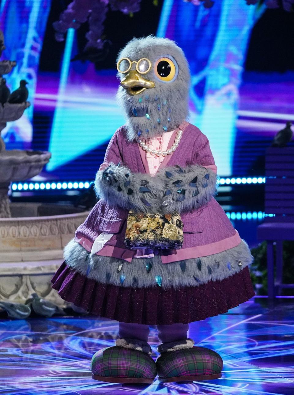masked singer clues this image and the information contained herein is strictly embargoed until 2100 thursday 5th january 2023from bandicoot tvthe masked singer sr4 ep2 on itv1 and itvxpictured pigeonthis photograph is c bandicoot tv and can only be reproduced for editorial purposes directly in connection with the programme or event mentioned above, or itv plc once made available by itv plc picture desk, this photograph can be reproduced once only up until the transmission tx date and no reproduction fee will be charged any subsequent usage may incur a fee this photograph must not be manipulated excluding basic cropping in a manner which alters the visual appearance of the person photographed deemed detrimental or inappropriate by itv plc picture desk this photograph must not be syndicated to any other company, publication or website, or permanently archived, without the express written permission of itv picture desk full terms and conditions are available on the website wwwitvcompresscentreitvpicturestermsfor further information please contactjameshilderitvcom