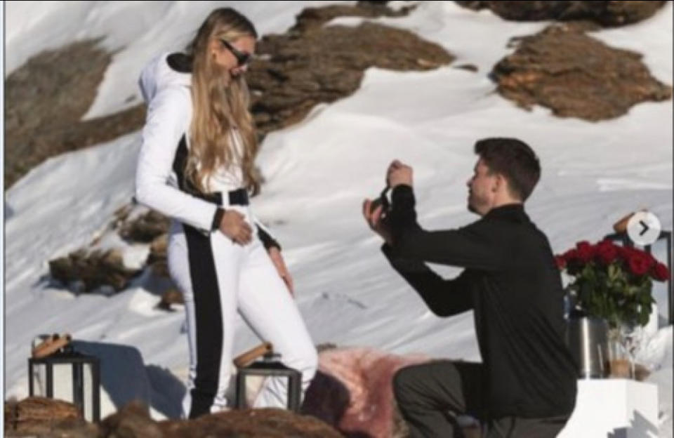 Victoria’s Secret Angel Romee Strijd was engaging in model behavior as she announced her engagement. Romee who was looking angelic in white was on top of the world following the happy news. Or rather on top of the Swiss Alps. Caption read: “I said Yes!”