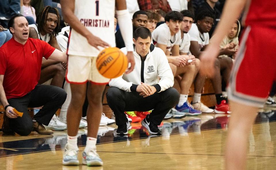 Modesto Christian coach Brice Fantazia, middle, watches the action in the first half of the Tri-City Athletic League game with Lincoln at Modesto Christian High School in Salida, Calif., Friday, Jan. 12, 2024. Andy Alfaro/aalfaro@modbee.com