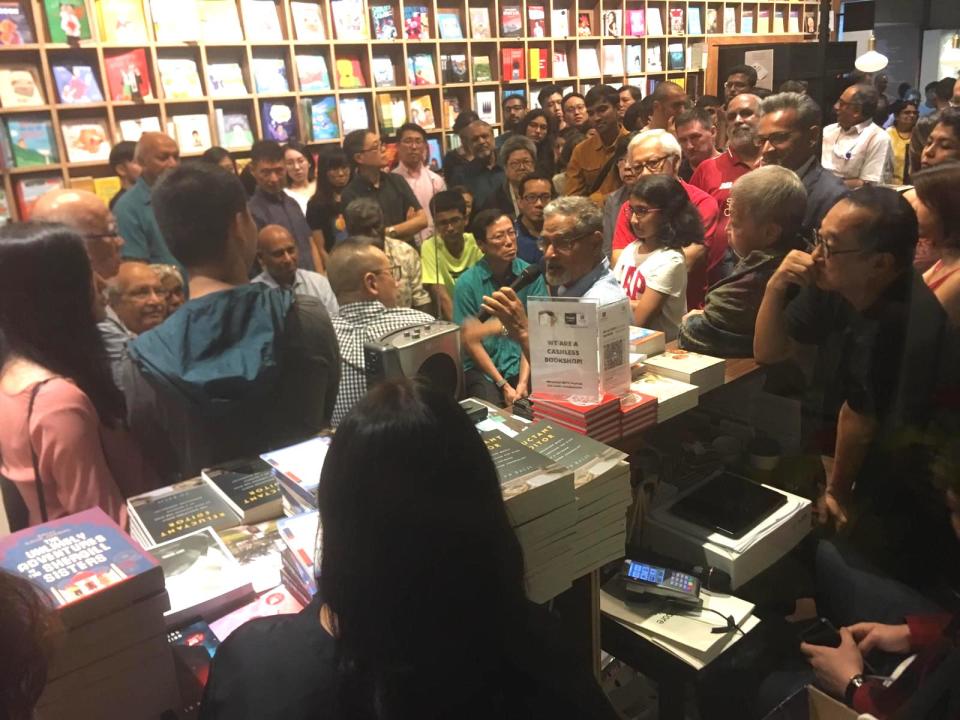 Veteran journalist PN Balji (centre), at the official launch of his book "Reluctant Editor" at Huggs-Epigram Coffee Bookshop on 14 June, 2019. (PHOTO: Nicholas Yong/Yahoo News Singapore)