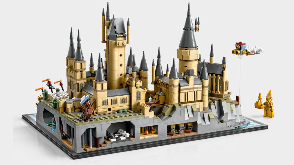 Lego Hogwarts Castle and Grounds set from behind on a plain background