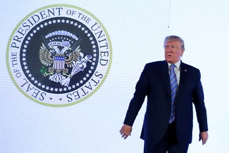 FILE PHOTO: U.S. President Trump stands next to altered presidential seal at Turning Point USA's Teen Student Action Summit in Washington