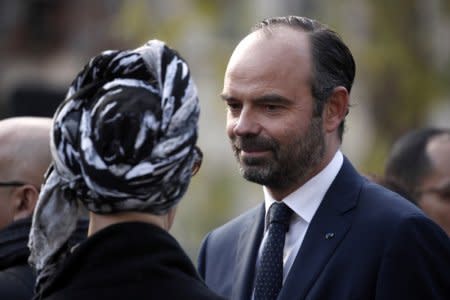 FILE PHOTO: French Prime Minister Edouard Philippe is seen after laying a wreath of flowers next to a commemorative plaque near the bar