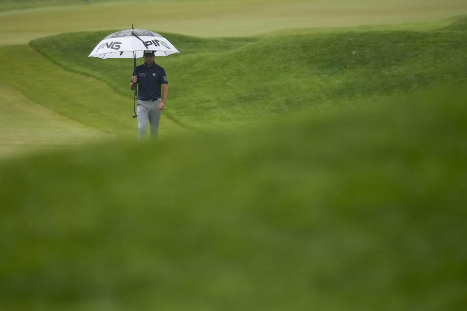 Corey Conners, of Canada, walks on the first hole during the second round of the PGA Championship golf tournament at Oak Hill Country Club on Friday, May 19, 2023, in Pittsford, N.Y. (AP Photo/Seth Wenig)