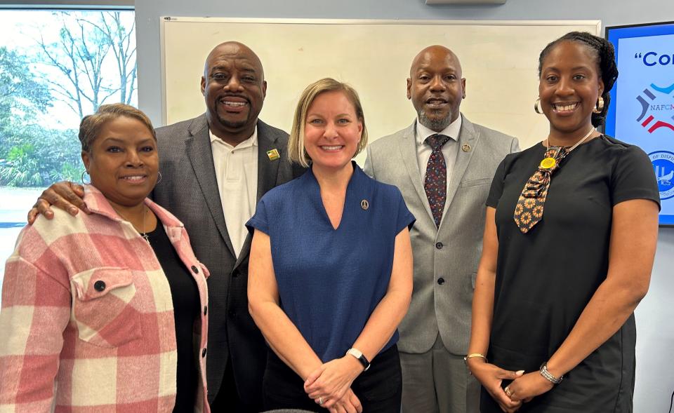 U.S. Department of Justice Conciliation Specialist, Dion Lyons poses alongside Mayor Van Johnson and the Savannah's Mediation Center's (front left to right) Chiquetta Thompson (director of youth education), Jill Cardenas (executive director) and Sherlisa Praylo (director of restorative practices & community outreach) on Wednesday March 6, 2024.