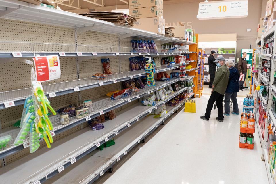 Grocery store shelves are empty in Halifax, Nova Scotia on Friday as people prepare for Hurricane Fiona to hit the region (AP)