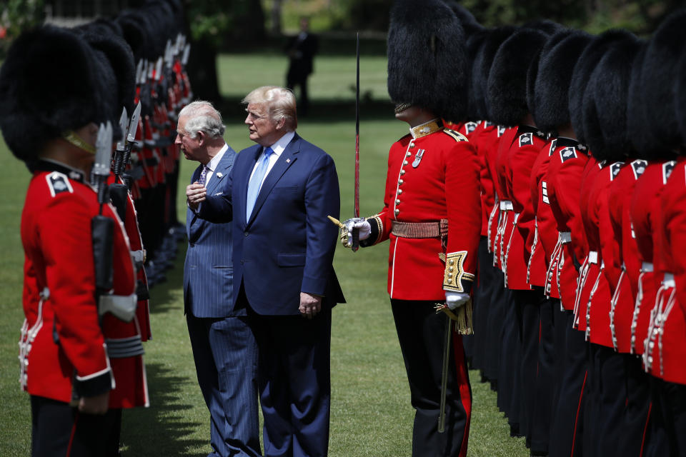 President Donald Trump and Prince Charles inspect the Guard of Honor at Buckingham Palace, Monday, June 3, 2019, in London. (AP Photo/Alex Brandon)