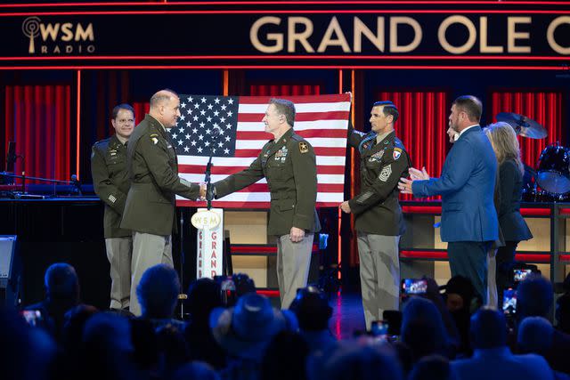 <p>Chris Hollo</p> Colonel Jordan (Ft. Campbell Garrison Commander), General Poppas (Commander, US Army Forces Command), Staff Sgt. Craig Morgan, Command Sergeant Major Stackpole (Ft Campbell Garrison Command), John Clement (Deputy State Director/Military Advisor, US Senator Marsha Blackburn), U.S. Senator Marsha Blackburn (R-Tenn.) on July 29, 2023