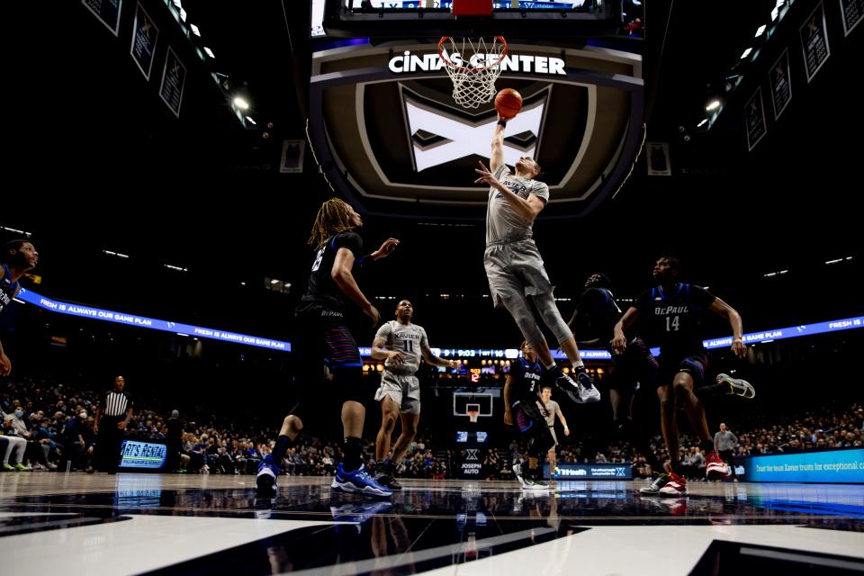 Xavier Musketeers forward Jack Nunge, shown here dunking against DePaul last season, is back for another season at Xavier in 2022-2023.