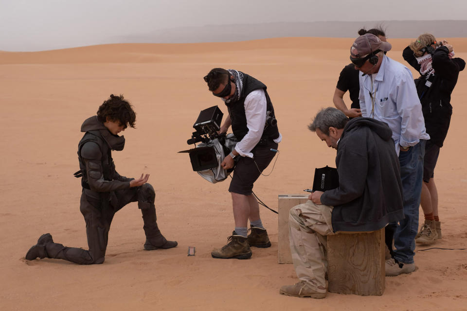 Cinematographer Greig Fraser and Denis Villeneuve get close to Timothee Chalamet. - Credit: Chia Bella James