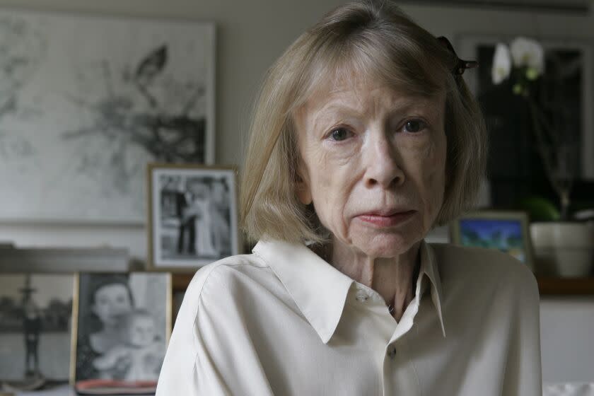 Author Joan Didion sits in her New York apartment on Sept. 26, 2005.