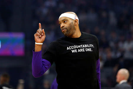 Mar 25, 2018; Sacramento, CA, USA; Sacramento Kings forward Vince Carter (15) stands on the court before the start of the game against the Boston Celtics at Golden 1 Center. Players from both teams wore t-shirts during warmups in honor of Stephon Clark, a Sacramento native who was recently shot and killed by Sacramento police. Cary Edmondson-USA TODAY Sports