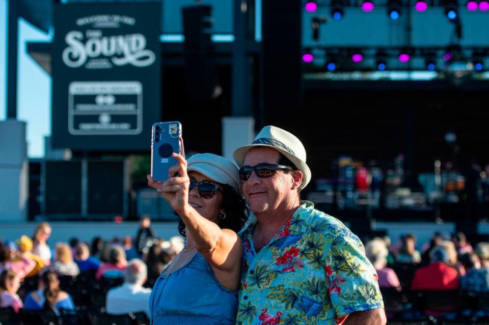 Fans take selfies before the start of the KC and The Sunshine Band concert at The Sound Amphitheater in Gautier on Friday, April 12, 2024. The show marks the multi-million dollar venue’s inaugural show. Hannah Ruhoff/Sun Herald