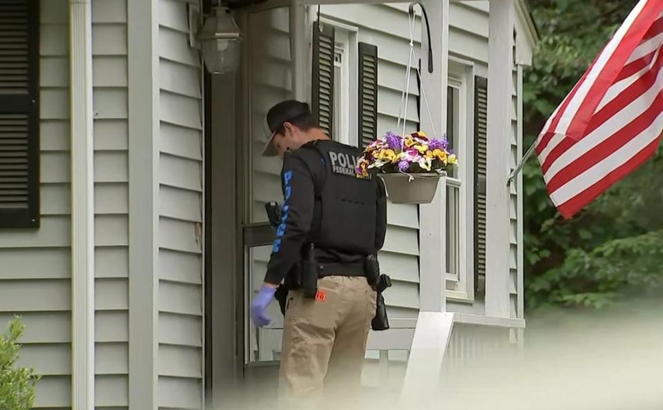 Authorities seized 13 pit bull-type dogs from John Murphy’s residence on East Washington Street in Hanson on June 7, 2023.