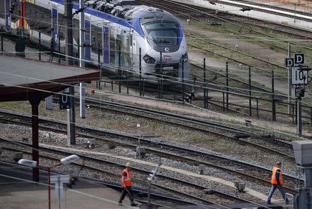 A new Regiolis regional train made by power and train-making firm Alstom, is seen next to a platform at Strasbourg's railway station, May, 21, 2014. REUTERS/Vincent Kessler