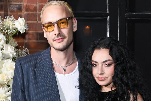 <p>David M. Benett/Jed Cullen/Dave Benett/Getty</p> George Daniel and Charli XCX attend the Vogue & Netflix party in celebration of the BAFTA Television Awards at Belvedere Restaurant in May 2023 in London