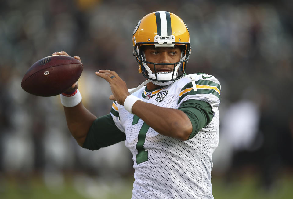 FILE - In this Aug. 24, 2018, file photo, Green Bay Packers quarterback Brett Hundley (7) warms up before an NFL preseason football game against the Oakland Raiders in Oakland, Calif. A person familiar with the deal says that the Seattle Seahawks have acquired Hundley from the Packers. The person spoke Wednesday, Aug. 29, 2018, to The Associated Press on condition of anonymity because the trade hasn't been announced by the teams. ESPN.com first reported the deal. (AP Photo/Ben Margot, File)