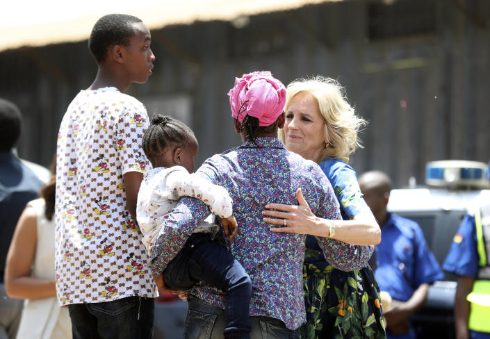 U.S. first lady Jill Biden, right, talks to a Kenyan mother in Kenya's slum Kibera in Nairobi, Kenya, Saturday, Feb. 25, 2023. (AP Photo/Brian Inganga)