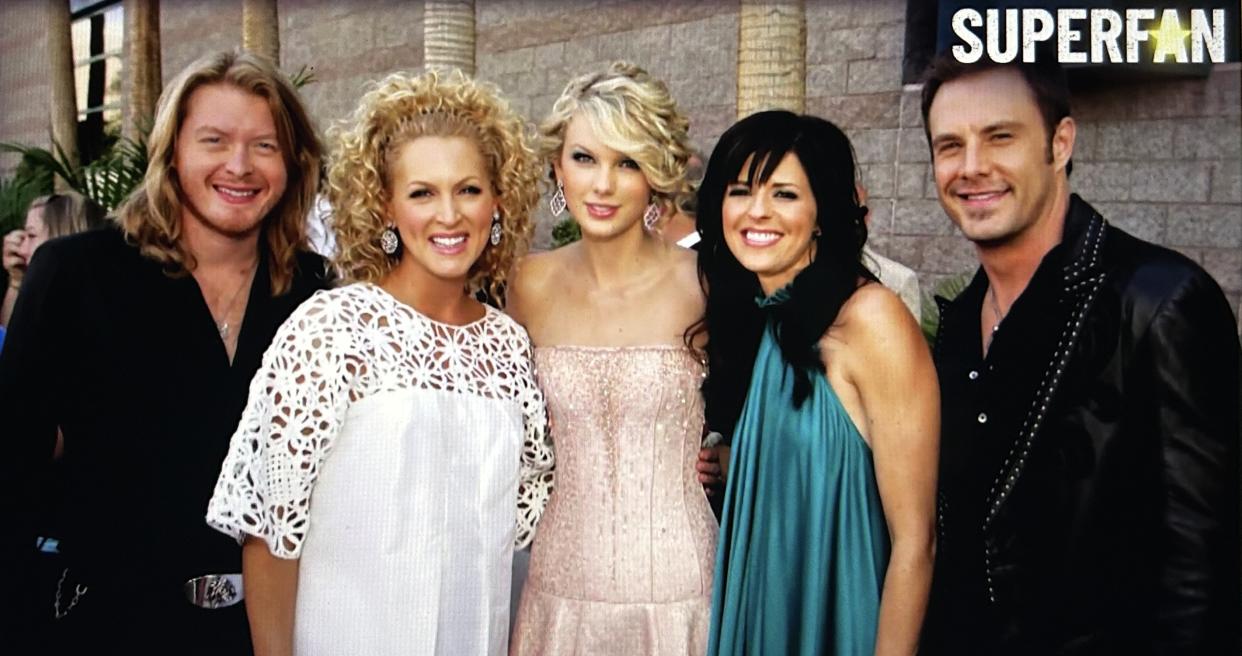 Taylor Swift is flanked by members of Little Big Town. (CBS)