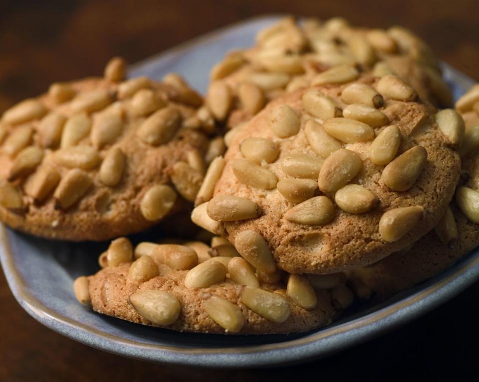 <p>Italian cookies of all sorts, whether pignolis, biscotti, amaretti or rainbow cookies, can be found in family-owned bakeries throughout New Jersey. Residents fill up a box and show up at gatherings with them throughout the year, and the holiday season is no exception.</p><p>Get the recipe from <a href="https://www.delish.com/cooking/a1110/pignoli-cookies-recipes/" rel="nofollow noopener" target="_blank" data-ylk="slk:Delish;elm:context_link;itc:0;sec:content-canvas" class="link ">Delish</a>.</p>