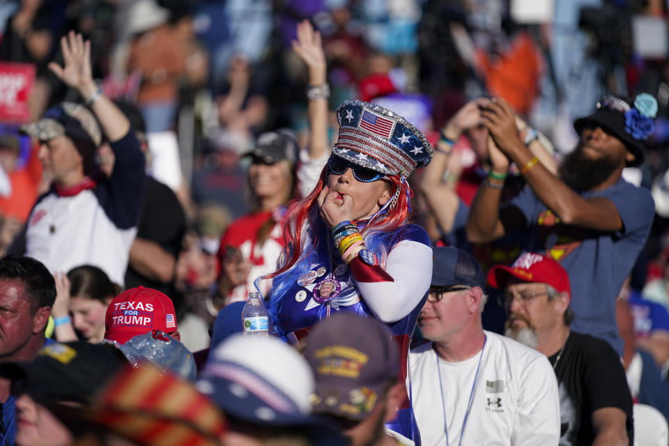 Supporters of former President Donald Trump cheer as he speak at a campaign rally at Waco Regional Airport, Saturday, March 25, 2023, in Waco, Texas. (AP Photo/Evan Vucci)